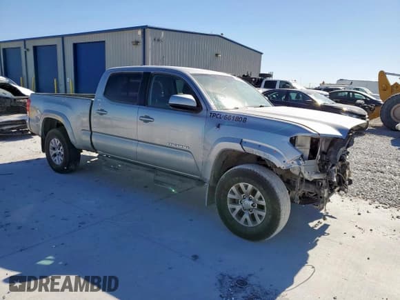✅ 2017 Toyota Tacoma SR5 • VIN: 5TFBZ5DN4HX003181 • Lot: 90752605. Wystawiony na Copart z przebiegiem 124 669 mil. Bezpłatny archiwum sprzedaży aukcyjnych z USA i szczegółowy raport historii pojazdu na DreamBid. Zdjęcie 4.