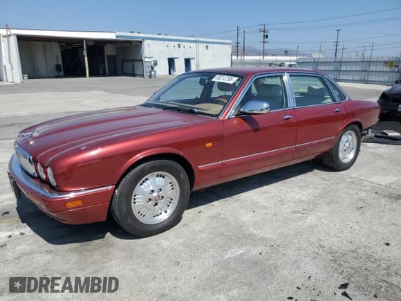 ✅ 1995 Jaguar XJ • VIN: SAJKX1744SC720830 • Lot: 69212295. Listed on Copart with 77,847 mi. Free auction sales archive from the USA and detailed vehicle history report at DreamBid. Image 1.