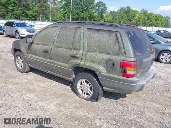 ✅ 2002 Jeep Grand Cherokee Laredo • VIN: 1J4GW48N32C266368 • Lot: 42439741. Listed on IAAI with 109,492 mi. Free auction sales archive from the USA and detailed vehicle history report at DreamBid. Image 3.