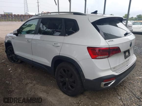 ✅ 2022 Volkswagen Taos SE • VIN: 3VVPX7B25NM021207 • Лот: 42681854. Опубликован ранее на IAAI с пробегом 23 198 миль. Бесплатный доступ к архиву аукционных продаж из США и подробный отчёт об истории автомобиля на DreamBid. Изображение 3.
