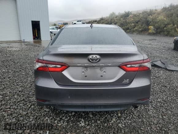 2021 Toyota Camry LE z VIN 4T1C11BK5MU037859, wystawiony jako Copart lot #85142925 z przebiegiem 44 771 mil mil oraz Szkoda całkowita • Salvage title. Historia ofert i sprzedaży dostępna na DreamBid. Obrazek 6.