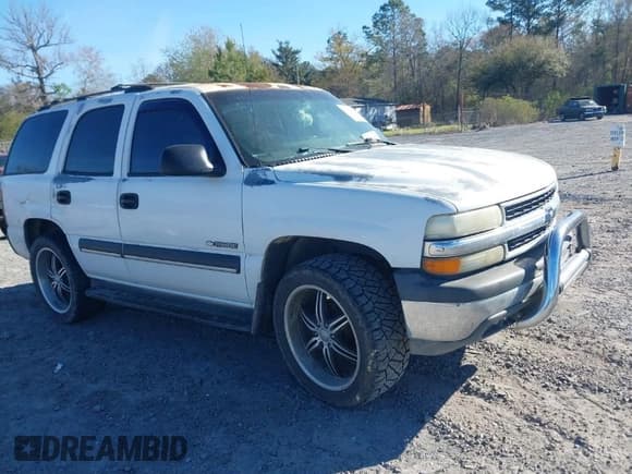 ✅ 2003 Chevrolet Tahoe LS • VIN: 1GNEC13V23J329623 • Lot: 41885652. Listed on IAAI with 277,112 mi. Free auction sales archive from the USA and detailed vehicle history report at DreamBid. Image 1.
