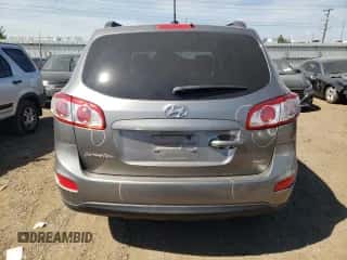 2012 Hyundai Santa Fe GLS с VIN 5XYZGDAB9CG156305, выставлен на аукционе Copart как лот 71676244 с пробегом 155 861 миль миль и Списание • Salvage title. История ставок и продаж доступна на DreamBid. Изображение 6.