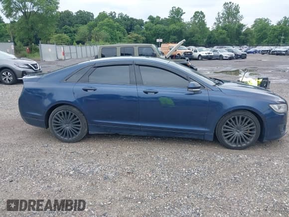 ✅ 2017 Lincoln MKZ Reserve • VIN: 3LN6L5F93HR644894 • Lot: 42634405. Wystawiony na IAAI z przebiegiem 127 139 mil. Bezpłatny archiwum sprzedaży aukcyjnych z USA i szczegółowy raport historii pojazdu na DreamBid. Zdjęcie 13.