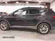 2017 Hyundai Santa Fe 2.0T z VIN 5XYZUDLA9HG433491, wystawiony jako IAAI lot #43298379 z przebiegiem 135 099 mil mil oraz . Historia ofert i sprzedaży dostępna na DreamBid. Obrazek 14.