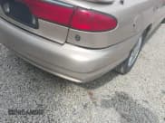 ✅ 1999 Ford Contour LX • VIN: 1FAFP6538XK135792 • Lot: 42443631. Listed on IAAI with 74,481 mi. Free auction sales archive from the USA and detailed vehicle history report at DreamBid. Image 21.