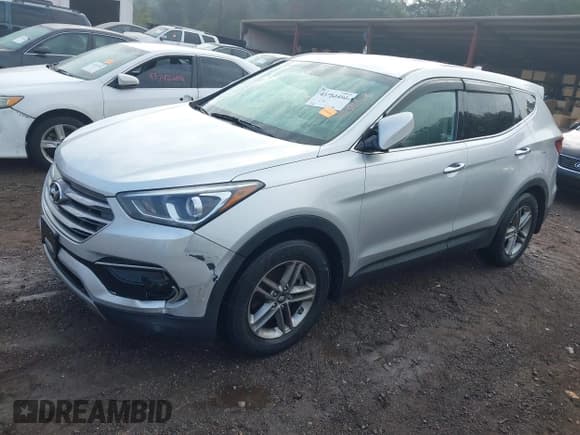 ✅ 2017 Hyundai Santa Fe 2.4L • VIN: 5XYZTDLB6HG485933 • Lot: 43753493. Listed on IAAI with 91,826 mi. Free auction sales archive from the USA and detailed vehicle history report at DreamBid. Image 18.