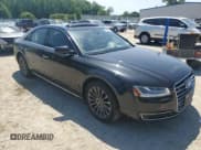 ✅ 2015 Audi A8 • VIN: WAUJGAFD2FN030416 • Lot: 54534635. Listed on Copart with 133,594 mi. Free auction sales archive from the USA and detailed vehicle history report at DreamBid. Image 4.