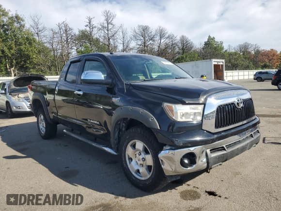 ✅ 2010 Toyota Tundra • VIN: 5TFUY5F1XAX101353 • Lot: 71681655. Listed on Copart with 144,091 mi. Free auction sales archive from the USA and detailed vehicle history report at DreamBid. Image 4.