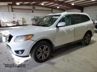 ✅ 2011 Hyundai Santa Fe SE • VIN: 5XYZHDAG5BG046293 • Lot: 82055114. Listed on Copart with 245,922 mi. Free auction sales archive from the USA and detailed vehicle history report at DreamBid. Image 1.