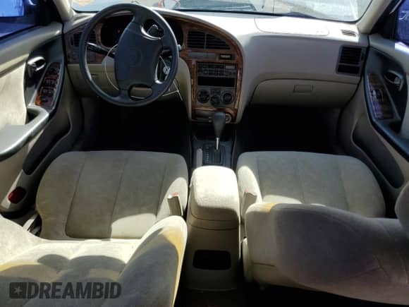 2003 Hyundai Elantra GLS z VIN KMHDN45D03U580901, wystawiony jako Copart lot #78920904 z przebiegiem 75 346 mil mil oraz Czysty tytuł • Clean title. Historia ofert i sprzedaży dostępna na DreamBid. Obrazek 8.