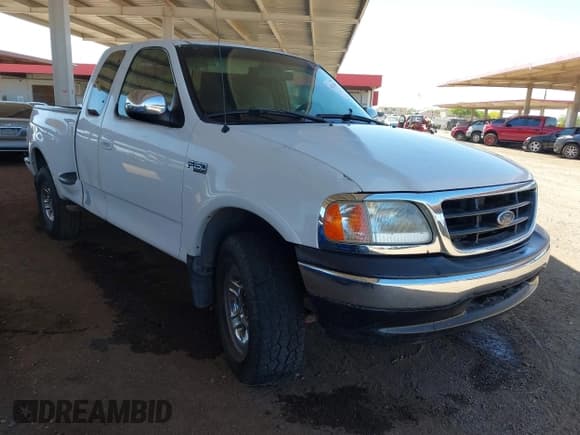 ✅ 1997 Ford F-150 • VIN: 1FTDX08W4VKC89238 • Lot: 42132010. Listed on IAAI with 204,386 mi. Free auction sales archive from the USA and detailed vehicle history report at DreamBid. Image 1.