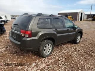 ✅ 2011 Mitsubishi Endeavor LS • VIN: 4A4JN2AS0BE004338 • Lot: 86506025. Listed on Copart with 111,208 mi. Free auction sales archive from the USA and detailed vehicle history report at DreamBid. Image 3.