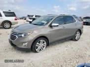 ✅ 2018 Chevrolet Equinox Premier • VIN: 3GNAXMEV9JS574111 • Лот: 90337365. Опубликован ранее на Copart с пробегом 110 928 миль. Бесплатный доступ к архиву аукционных продаж из США и подробный отчёт об истории автомобиля на DreamBid. Изображение 1.