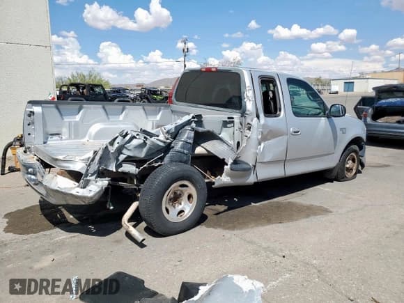 ✅ 1999 Ford F-150 • VIN: 1FTRX07W6XKB31655 • Lot: 70813555. Listed on Copart with 151,996 mi. Free auction sales archive from the USA and detailed vehicle history report at DreamBid. Image 3.