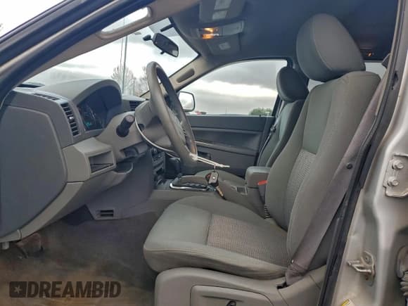 ✅ 2007 Jeep Grand Cherokee Laredo • VIN: 1J8GR48K57C680366 • Lot: 91574885. Listed on Copart with 166,498 mi. Free auction sales archive from the USA and detailed vehicle history report at DreamBid. Image 7.