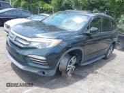 ✅ 2016 Honda Pilot EX-L • VIN: 5FNYF5H66GB008705 • Lot: 42806084. Wystawiony na IAAI z przebiegiem 168 753 mil. Bezpłatny archiwum sprzedaży aukcyjnych z USA i szczegółowy raport historii pojazdu na DreamBid. Zdjęcie 18.