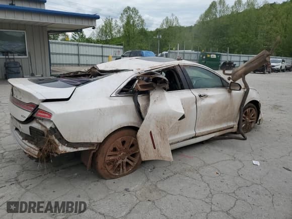 ✅ 2014 Lincoln MKZ Hybrid • VIN: 3LN6L2LU3ER833502 • Lot: 55996595. Listed on Copart with Not provided. Free auction sales archive from the USA and detailed vehicle history report at DreamBid. Image 3.