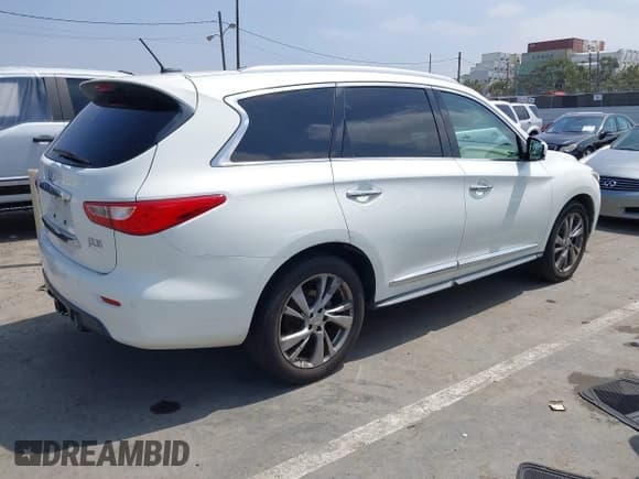 ✅ 2013 Infiniti JX35 • VIN: 5N1AL0MM0DC308522 • Lot: 42497631. Listed on IAAI with 181,935 mi. Free auction sales archive from the USA and detailed vehicle history report at DreamBid. Image 4.