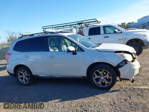 ✅ 2016 Subaru Forester Touring • VIN: JF2SJAXC5GH520915 • Лот: 43701083. Опубликован ранее на IAAI с пробегом 150 255 миль. Бесплатный доступ к архиву аукционных продаж из США и подробный отчёт об истории автомобиля на DreamBid. Изображение 13.
