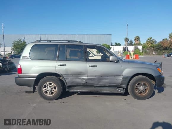 ✅ 2001 Lexus LX 470 • VIN: JTJHT00W113500583 • Lot: 42373922. Wystawiony na IAAI z przebiegiem 269 323 mil. Bezpłatny archiwum sprzedaży aukcyjnych z USA i szczegółowy raport historii pojazdu na DreamBid. Zdjęcie 13.