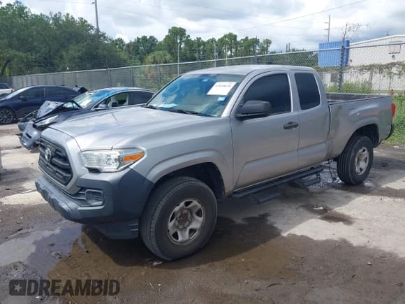 ✅ 2016 Toyota Tacoma SR • VIN: 5TFRX5GN9GX054707 • Lot: 43018610. Listed on IAAI with 180,706 mi. Free auction sales archive from the USA and detailed vehicle history report at DreamBid. Image 2.