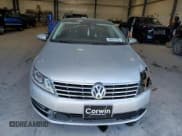 ✅ 2014 Volkswagen CC Executive • VIN: WVWRN7AN6EE524274 • Lot: 88057495. Listed on Copart with 112,058 mi. Free auction sales archive from the USA and detailed vehicle history report at DreamBid. Image 5.