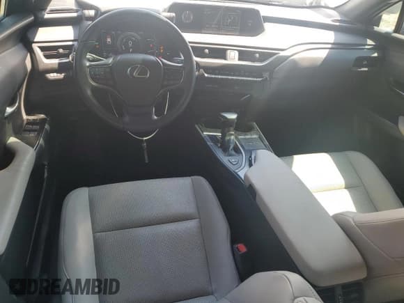 ✅ 2021 Lexus UX 250h • VIN: JTHP9JBH1M2041128 • Лот: 69633995. Опубликован ранее на Copart с пробегом 61 092 миль. Бесплатный доступ к архиву аукционных продаж из США и подробный отчёт об истории автомобиля на DreamBid. Изображение 8.