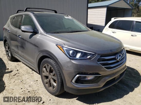 ✅ 2018 Hyundai Santa Fe Ultimate • VIN: 5XYZWDLA3JG571334 • Lot: 48331753. Listed on Copart with Not provided. Free auction sales archive from the USA and detailed vehicle history report at DreamBid. Image 4.