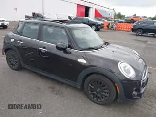 ✅ 2015 MINI Hardtop 4 Door S • VIN: WMWXU3C50F2B66317 • Lot: 43038658. Wystawiony na IAAI z przebiegiem 61 128 mil. Bezpłatny archiwum sprzedaży aukcyjnych z USA i szczegółowy raport historii pojazdu na DreamBid. Zdjęcie 1.