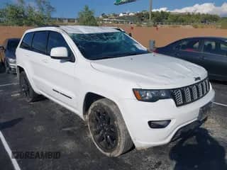 2018 Jeep Grand Cherokee Altitude z VIN 1C4RJFAG1JC191124, wystawiony jako IAAI lot #43267559 z przebiegiem 123 939 mil mil oraz . Historia ofert i sprzedaży dostępna na DreamBid. Obrazek 1.