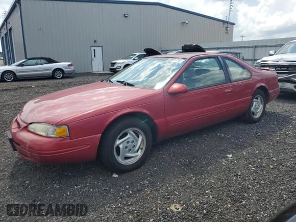 ✅ 1997 Ford Thunderbird LX • VIN: 1FALP62W4VH122159 • Lot: 65991795. Listed on Copart with 115,091 mi. Free auction sales archive from the USA and detailed vehicle history report at DreamBid. Image 1.