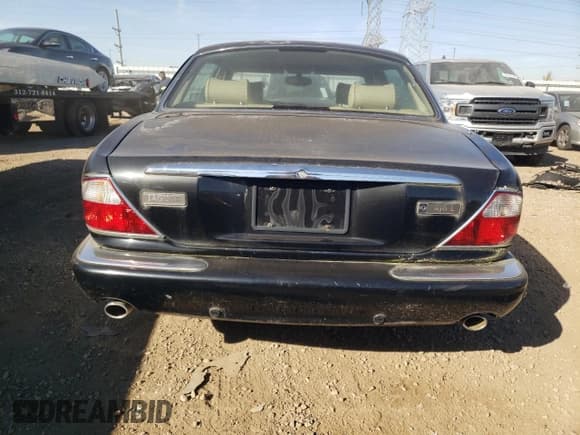 ✅ 2001 Jaguar XJ • VIN: SAJDA23C31LF28667 • Lot: 76983144. Wystawiony na Copart z przebiegiem 87 542 mil. Bezpłatny archiwum sprzedaży aukcyjnych z USA i szczegółowy raport historii pojazdu na DreamBid. Zdjęcie 6.