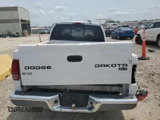 2004 Dodge Dakota SLT with VIN 1D7HL48K14S719751, listed as a Copart auction lot 64031654 with 288,226 mi miles and Salvage title. Bid and sale history available at DreamBid. Image 6.