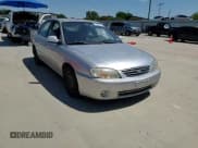 ✅ 2002 Kia Spectra • VIN: KNAFB121225139436 • Лот: 71047615. Опубликован ранее на Copart с пробегом 128 223 миль. Бесплатный доступ к архиву аукционных продаж из США и подробный отчёт об истории автомобиля на DreamBid. Изображение 13.