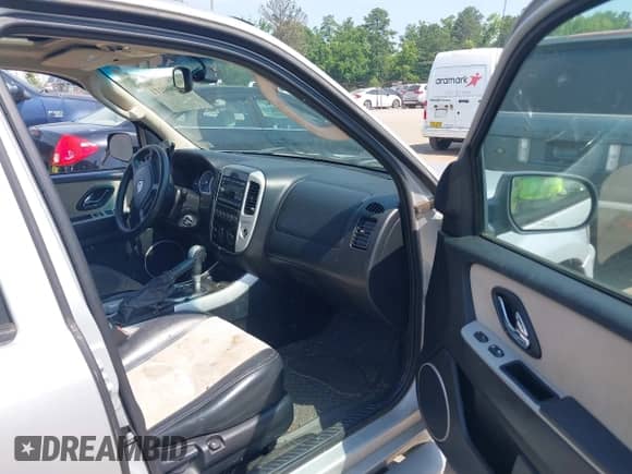 2006 Mercury Mariner Luxury с VIN 4M2CU57106DJ03167, выставлен на аукционе IAAI как лот 42600111 с пробегом 273 239 миль миль и . История ставок и продаж доступна на DreamBid. Изображение 5.