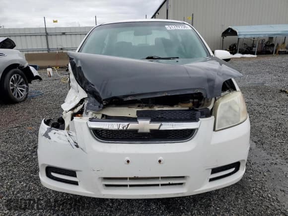 ✅ 2007 Chevrolet Aveo LS • VIN: KL1TD56617B044721 • Lot: 51772795. Wystawiony na Copart z przebiegiem 249 689 mil. Bezpłatny archiwum sprzedaży aukcyjnych z USA i szczegółowy raport historii pojazdu na DreamBid. Zdjęcie 5.