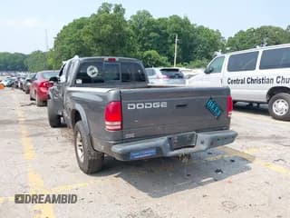 ✅ 2002 Dodge Dakota Sport • VIN: 1B7GL32X92S644072 • Lot: 42400800. Wystawiony na IAAI z przebiegiem 232 611 mil. Bezpłatny archiwum sprzedaży aukcyjnych z USA i szczegółowy raport historii pojazdu na DreamBid. Zdjęcie 3.