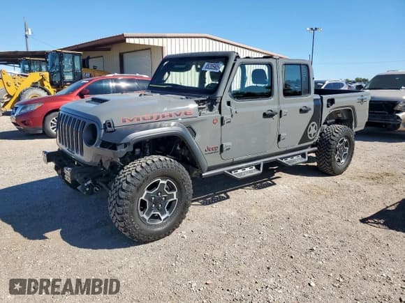✅ 2023 Jeep Gladiator Mojave • VIN: 1C6JJTEGXPL524832 • Lot: 85205905. Listed on Copart with 14,561 mi. Free auction sales archive from the USA and detailed vehicle history report at DreamBid. Image 1.
