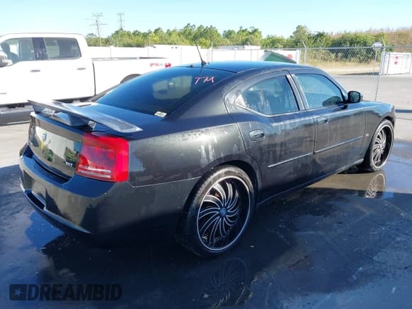 ✅ 2008 Dodge Charger SXT • VIN: 2B3KA33G08H108398 • Lot: 43694032. Listed on IAAI with 189,985 mi. Free auction sales archive from the USA and detailed vehicle history report at DreamBid. Image 4.