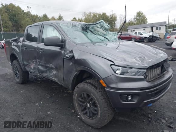 ✅ 2020 Ford Ranger Lariat • VIN: 1FTER4FH0LLA56202 • Lot: 43394940. Listed on IAAI with 65,140 mi. Free auction sales archive from the USA and detailed vehicle history report at DreamBid. Image 1.