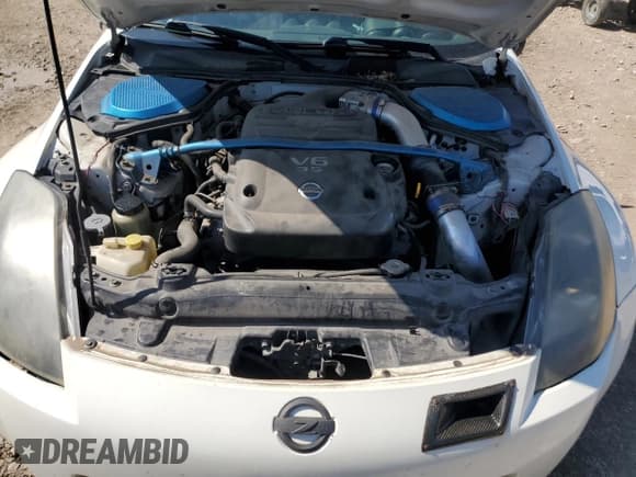 ✅ 2005 Nissan 350Z • VIN: JN1AZ34D05M604000 • Лот: 81687495. Опубликован ранее на Copart с пробегом 182 165 миль. Бесплатный доступ к архиву аукционных продаж из США и подробный отчёт об истории автомобиля на DreamBid. Изображение 11.