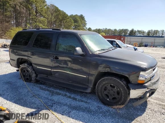 ✅ 2004 Chevrolet Tahoe LS • VIN: 1GNEC13Z04R220177 • Lot: 48406255. Listed on Copart with 215,167 mi. Free auction sales archive from the USA and detailed vehicle history report at DreamBid. Image 4.