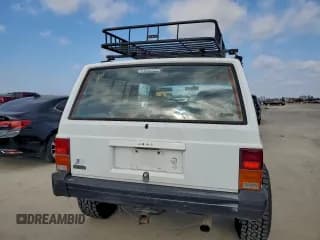 ✅ 1992 Jeep Cherokee • VIN: 1J4FJ27S8NL230735 • Lot: 93312835. Wystawiony na Copart z przebiegiem 205 618 mil. Bezpłatny archiwum sprzedaży aukcyjnych z USA i szczegółowy raport historii pojazdu na DreamBid. Zdjęcie 6.