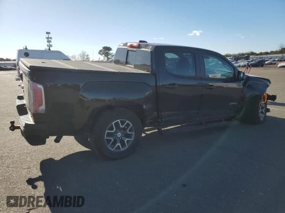 ✅ 2021 GMC Canyon 4WD AT4 • VIN: 1GTG6FEN0M1251119 • Lot: 88687565. Listed on Copart with 114,839 mi. Free auction sales archive from the USA and detailed vehicle history report at DreamBid. Image 3.