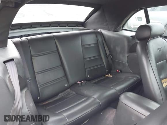 ✅ 2004 Ford Mustang Deluxe • VIN: 1FAFP44694F208401 • Lot: 43871483. Listed on IAAI with 133,344 mi. Free auction sales archive from the USA and detailed vehicle history report at DreamBid. Image 8.