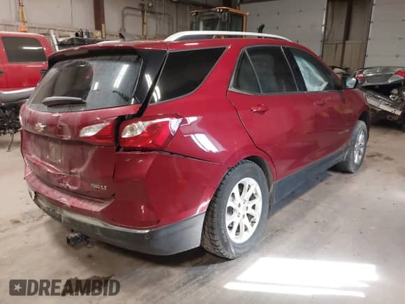 2018 Chevrolet Equinox LT z VIN 2GNAXSEVXJ6112062, wystawiony jako IAAI lot #43406177 z przebiegiem 69 608 mil mil oraz . Historia ofert i sprzedaży dostępna na DreamBid. Obrazek 4.