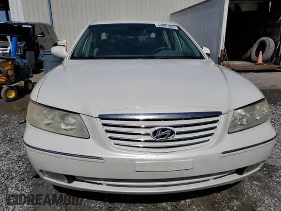 2007 Hyundai Azera SE с VIN KMHFC46F07A217097, выставлен на аукционе Copart как лот 62909955 с пробегом 119 729 миль миль и Списание • Salvage title. История ставок и продаж доступна на DreamBid. Изображение 5.
