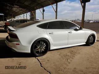 ✅ 2014 Audi RS 7 Prestige • VIN: WUAW2AFC8EN902596 • Лот: 79125134. Опубликован ранее на Copart с пробегом 80 122 миль. Бесплатный доступ к архиву аукционных продаж из США и подробный отчёт об истории автомобиля на DreamBid. Изображение 3.