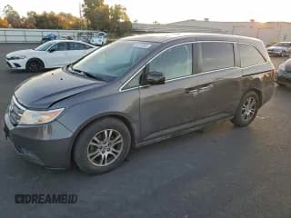 ✅ 2012 Honda Odyssey EX-L • VIN: 5FNRL5H6XCB113111 • Lot: 94270805. Listed on Copart with 93,620 mi. Free auction sales archive from the USA and detailed vehicle history report at DreamBid. Image 1.